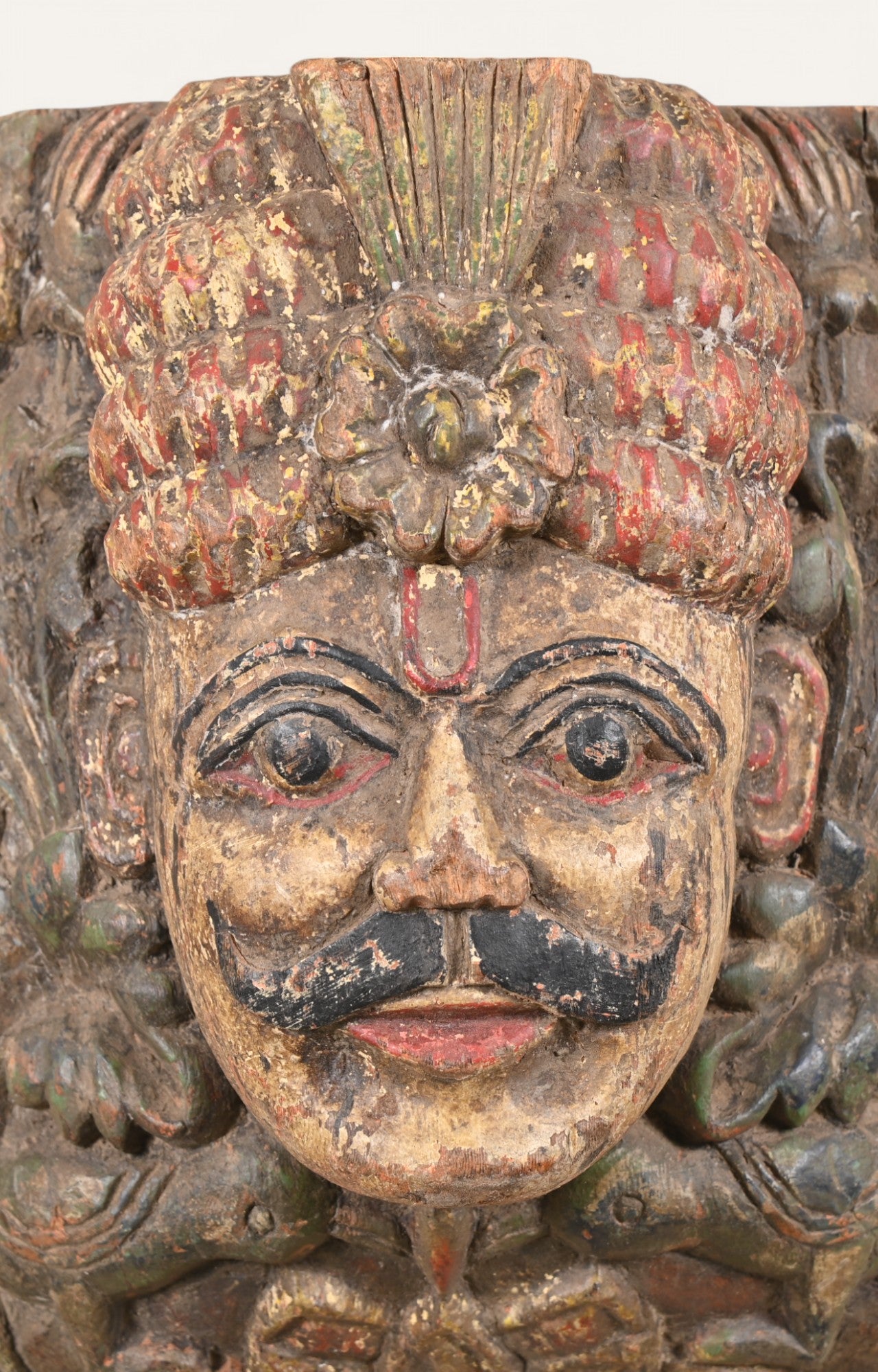 Regal Hand-Carved Wooden Mask