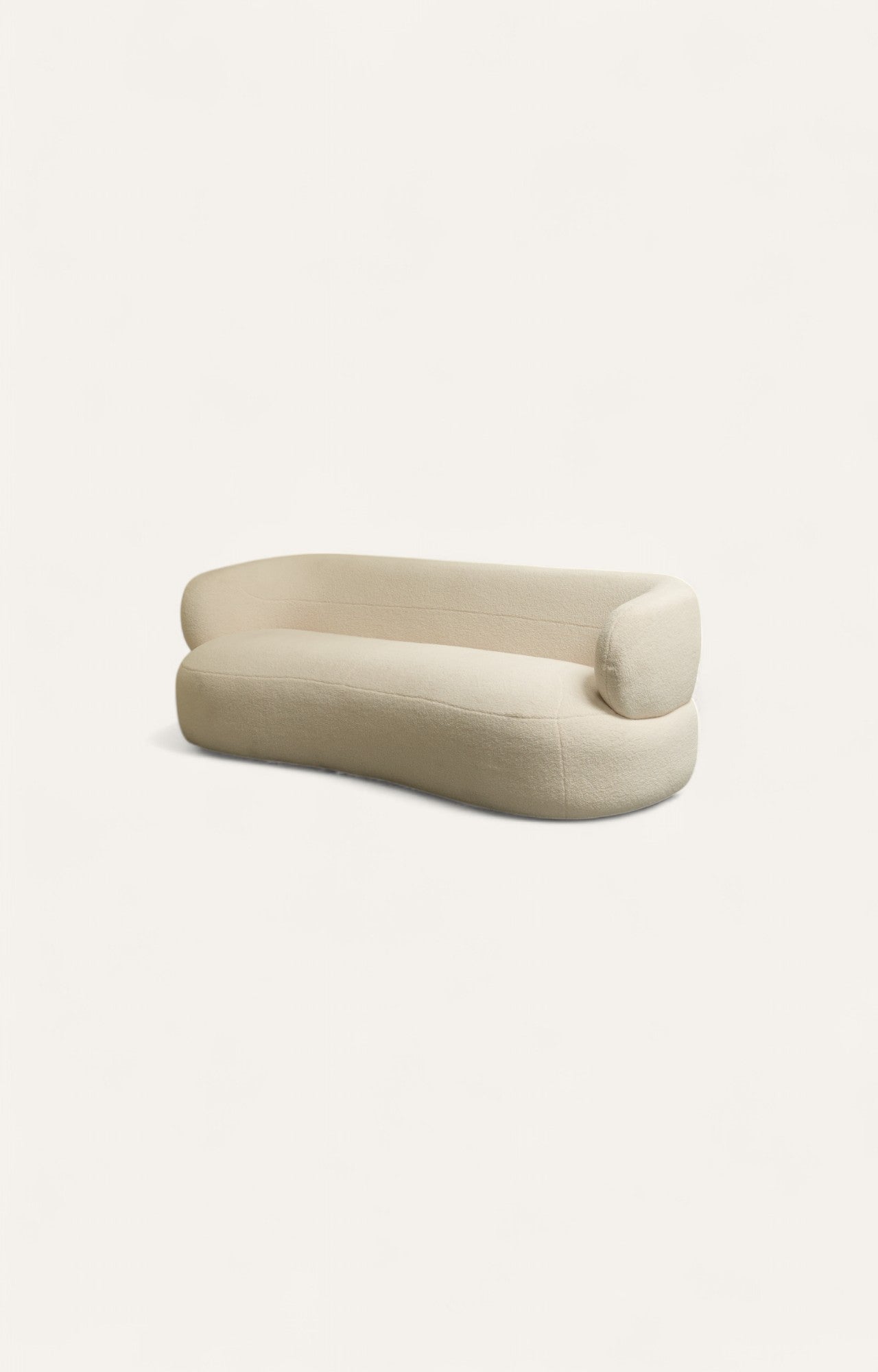 Bouclé curved sofa with sculptural back and smooth upholstery