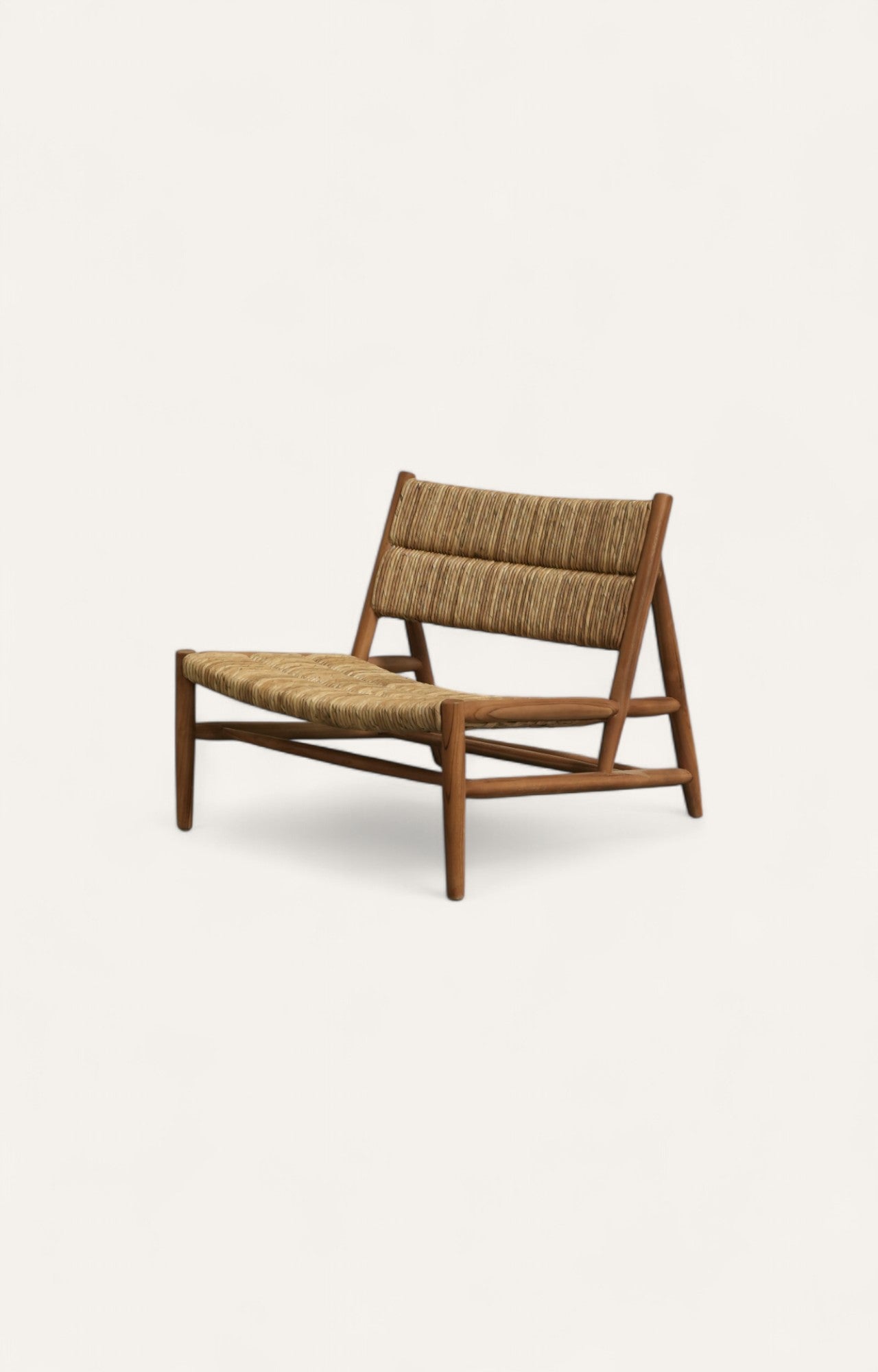 Low-slung chair made of teak wood with a hand-woven natural twisted pandan leaf seat and back.