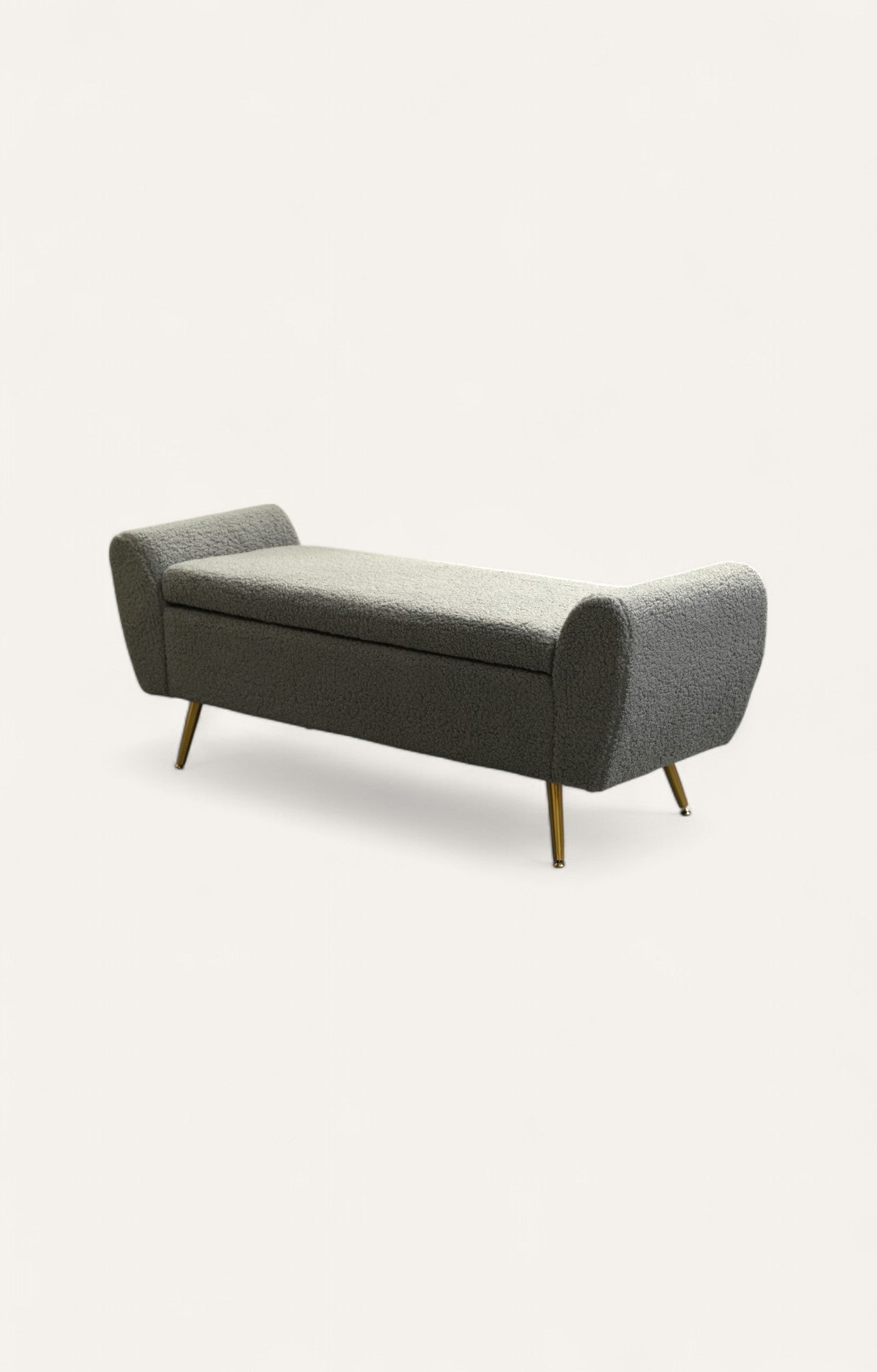 Charcoal-toned curved bouclé bench with smooth plywood legs and additional storage.