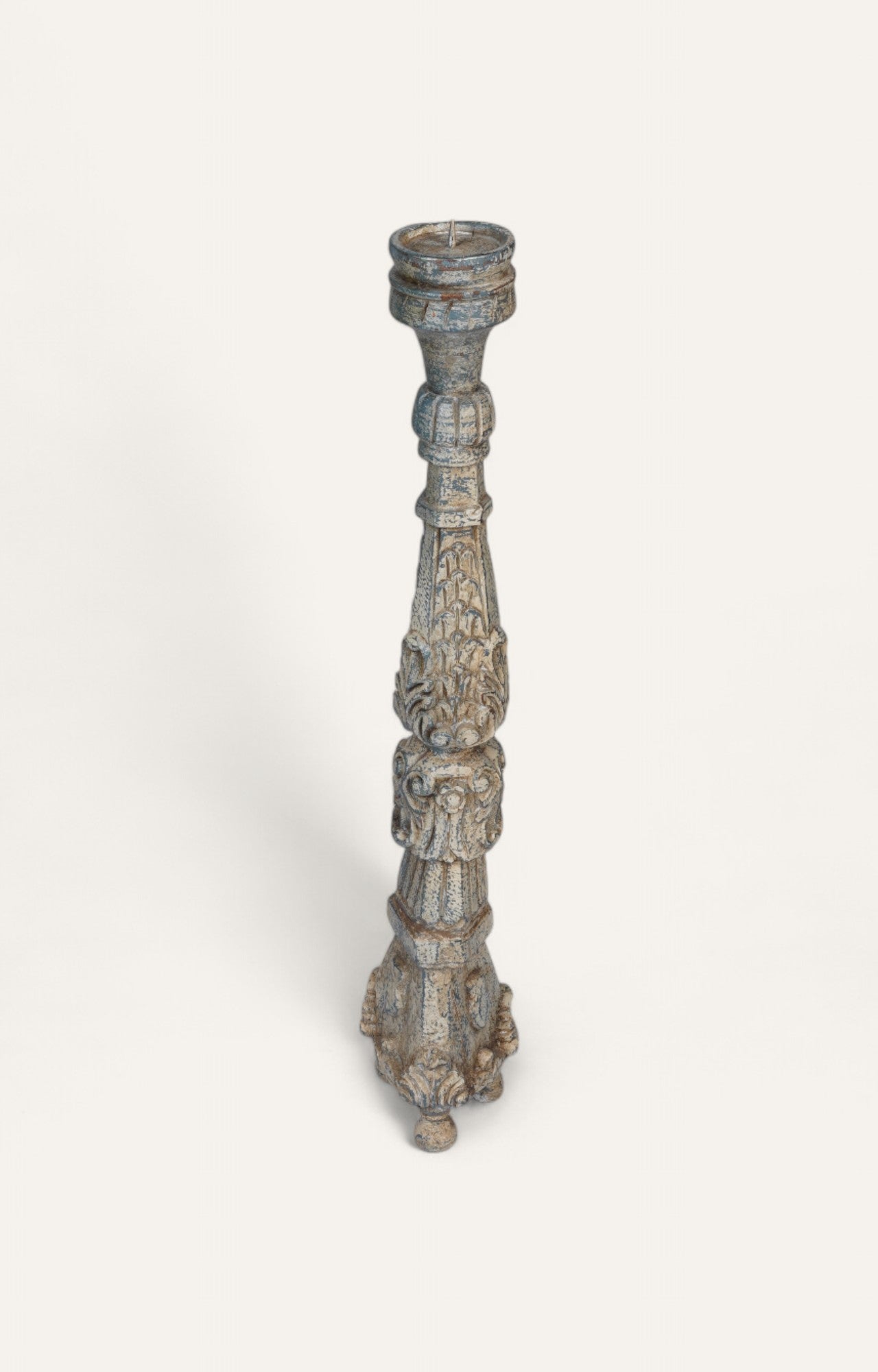 Distressed blue teak wood candle stand with acanthus leaf carving and dusty blue patina