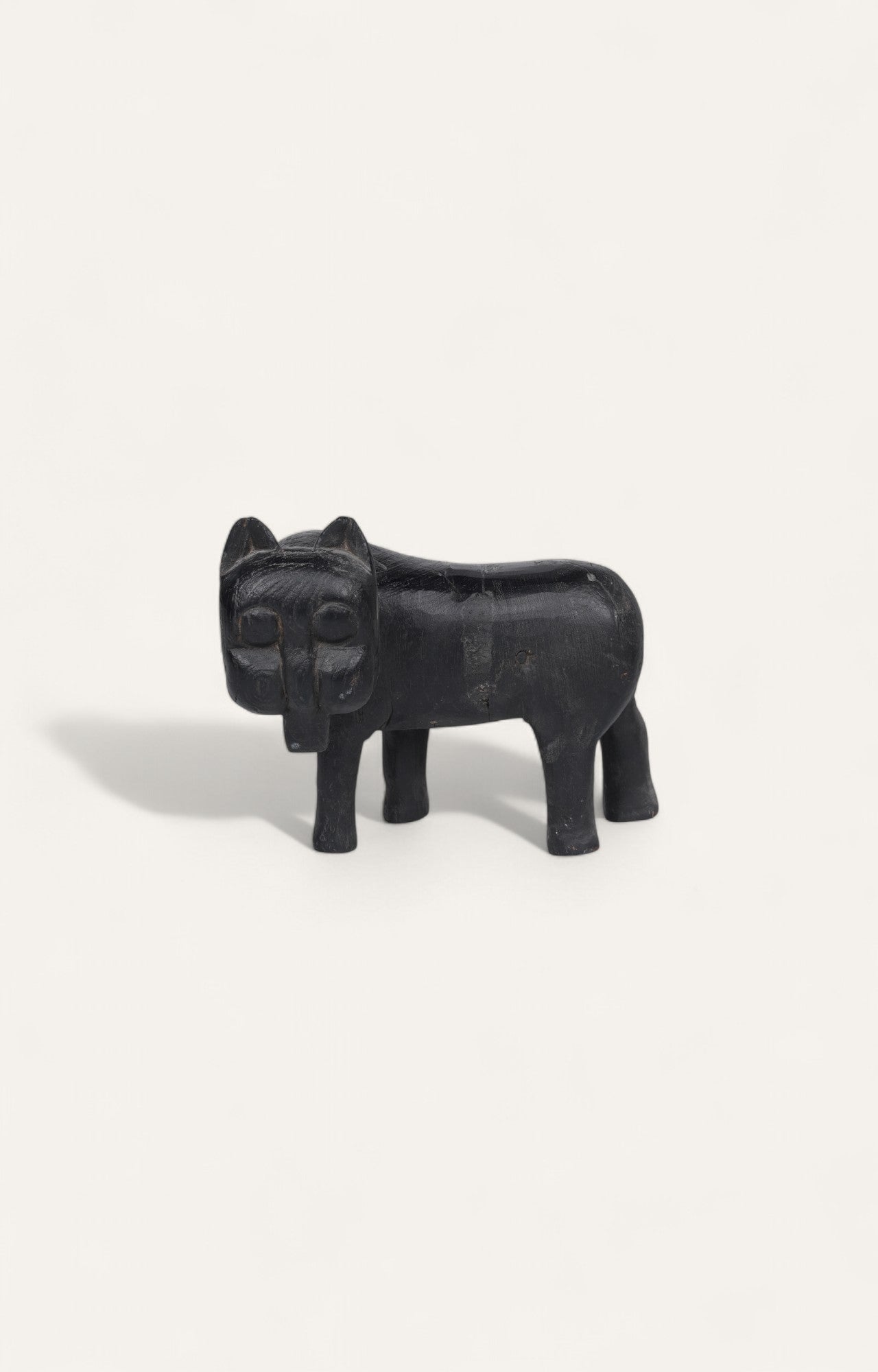 Primitive Black Lion Figurine