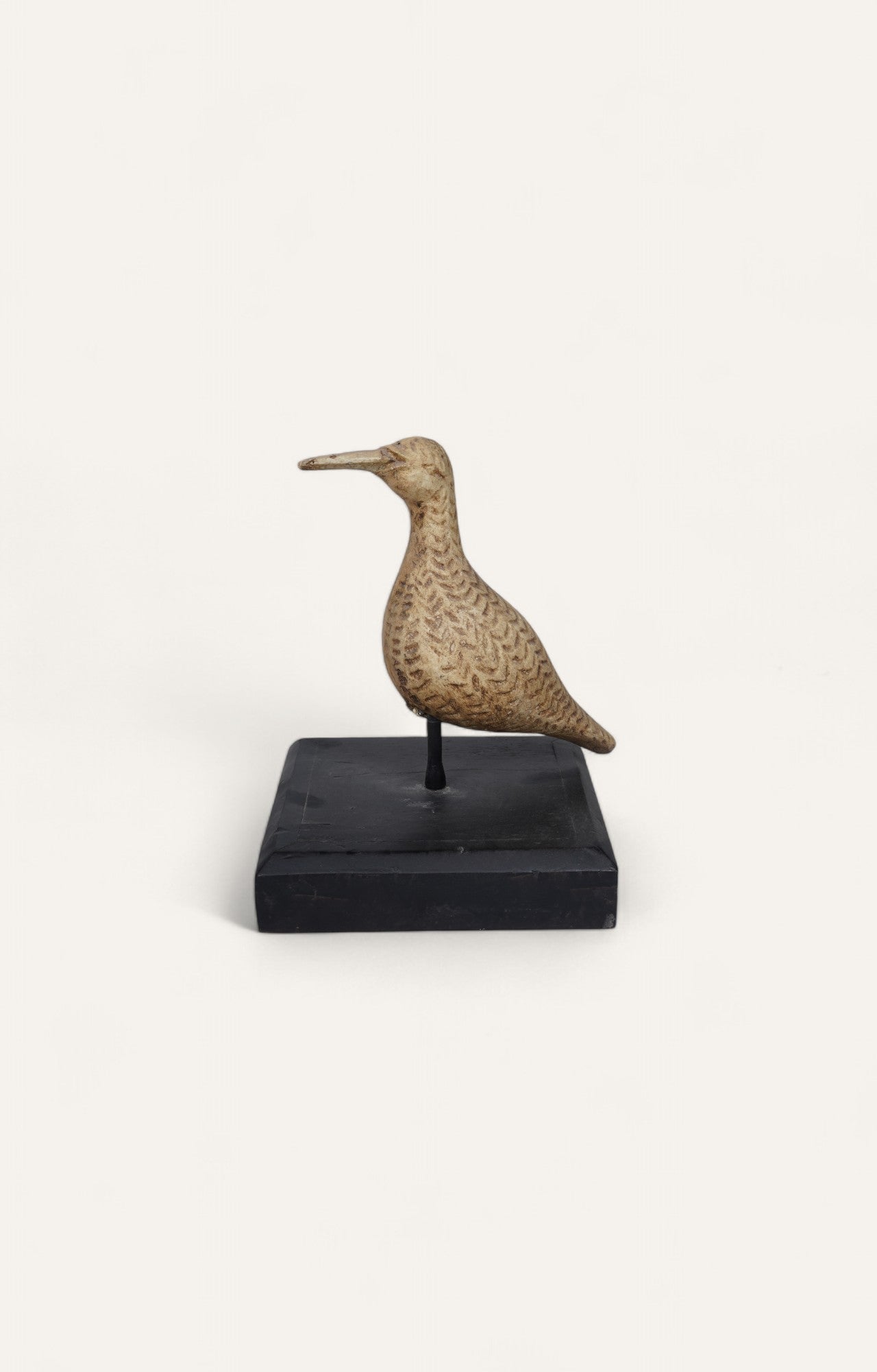 Hand-carved teak wood shore bird on iron stand with feather detail