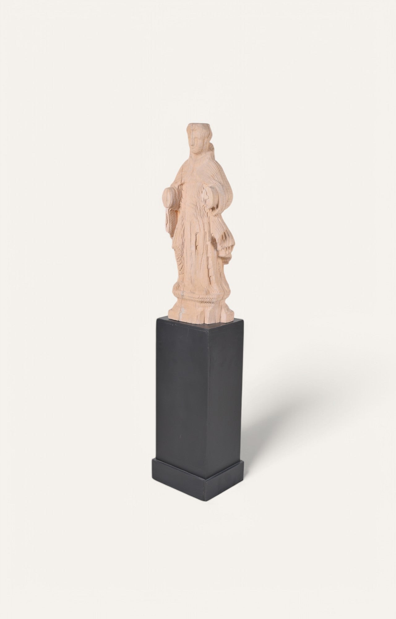 Hand-carved Teak Saint Figurine