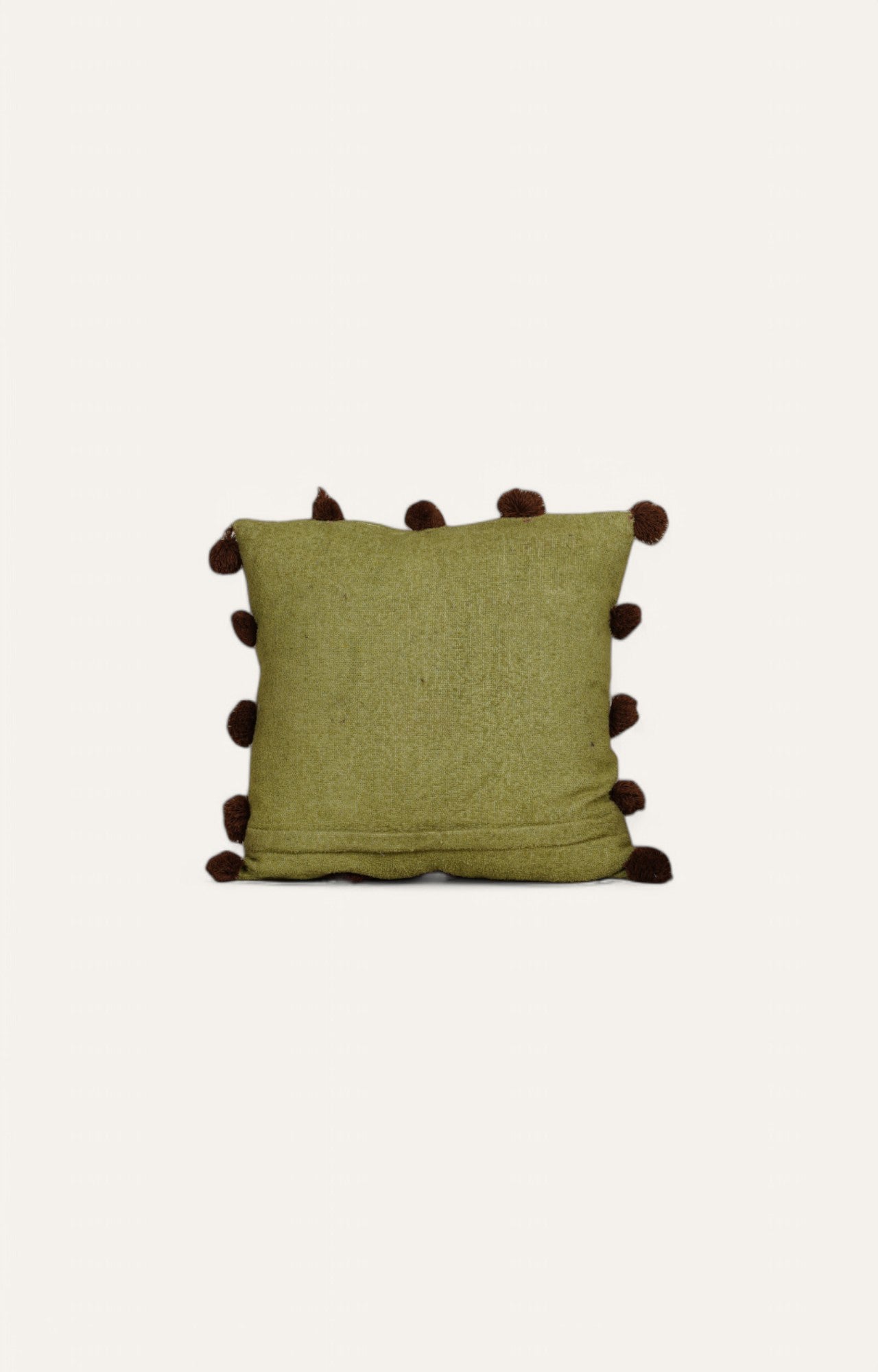 This Green Textured Cushion with Pom-Pom Detailing