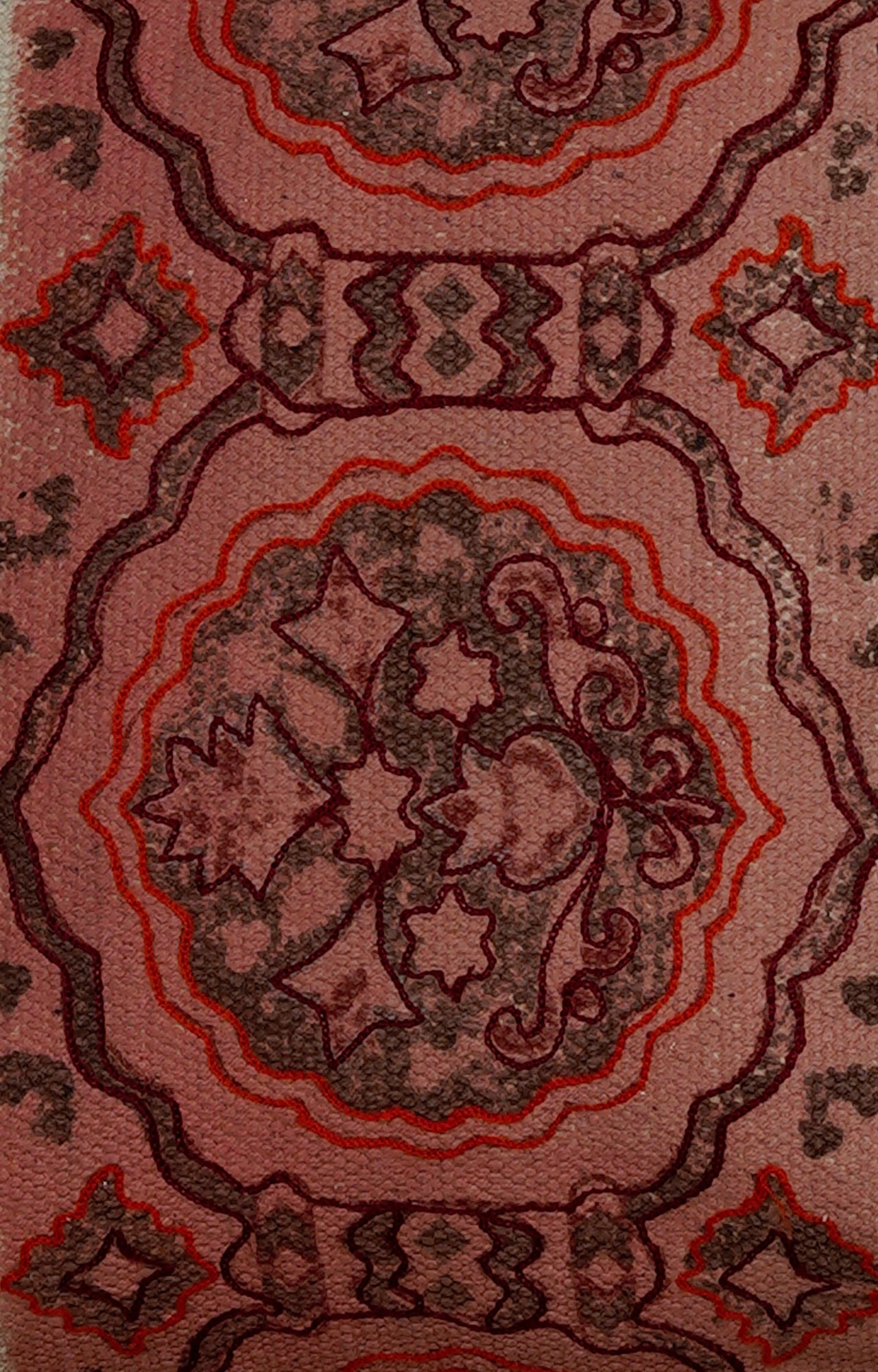 Intricate Patterned Cushion with Pom-Pom Accents