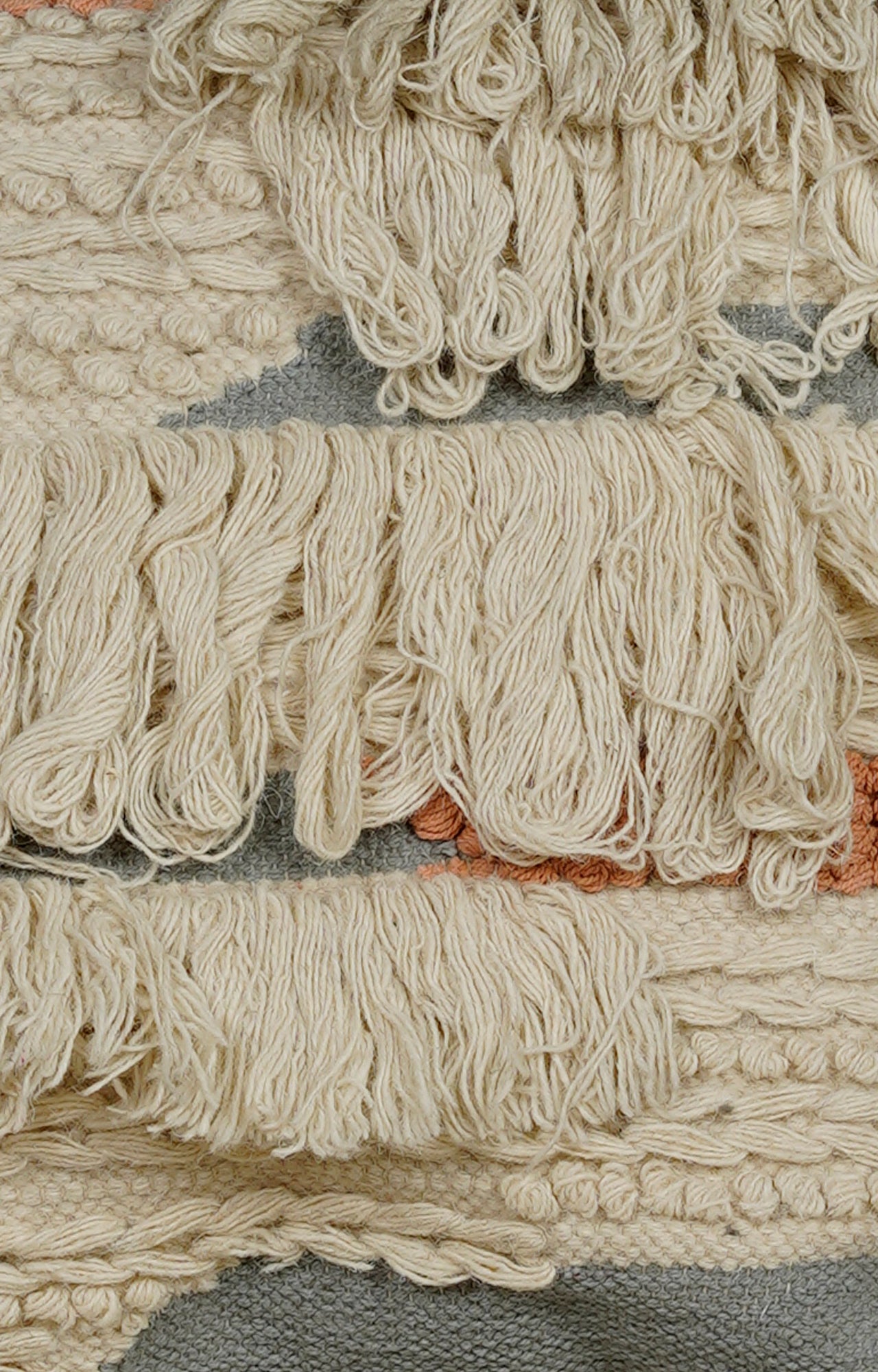 Handwoven Textured Cushion with Layered Fringes