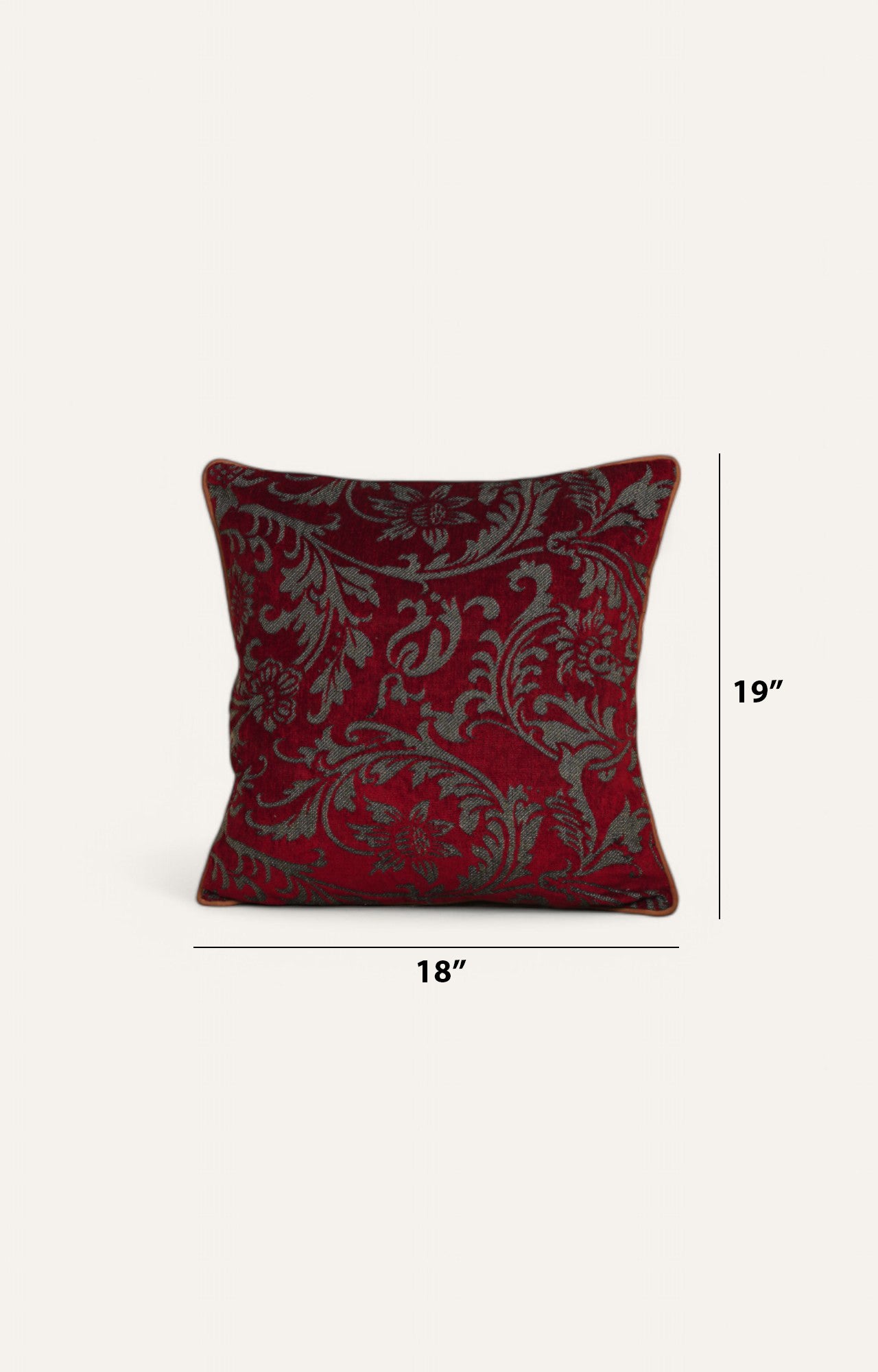 Red Cushion with Intricate Floral Pattern