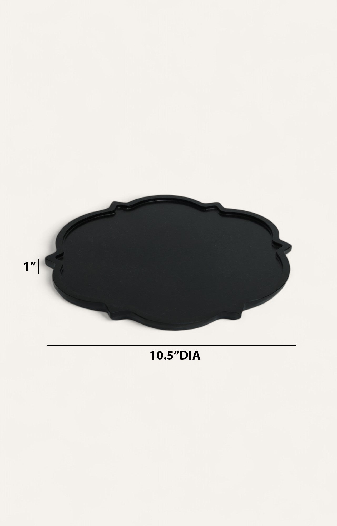Set of 3 scalloped-edge black marble platters in large, medium, and small sizes.