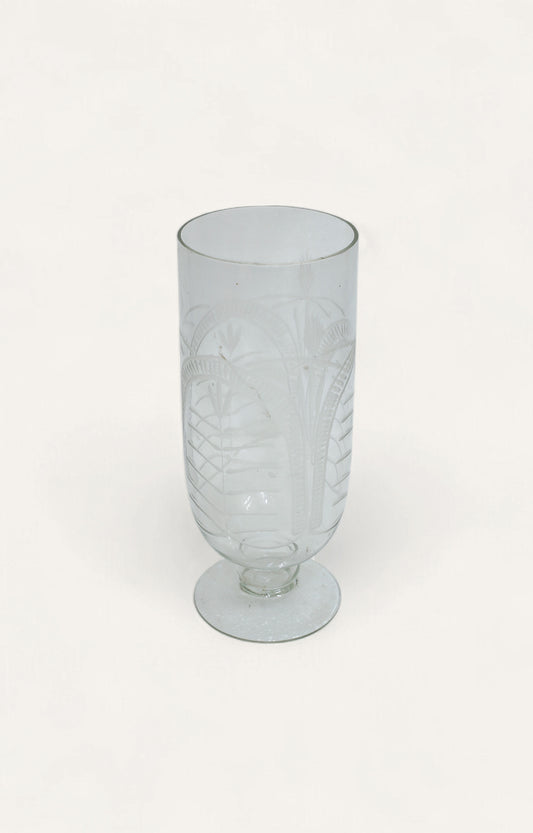 Clear glass candle stand with etched palm leaf design and pedestal base, 10.5 inches tall