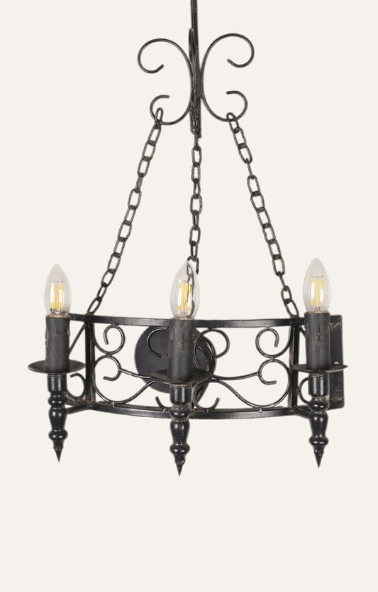 French-style black wall chandelier with three candle-style LED bulbs.