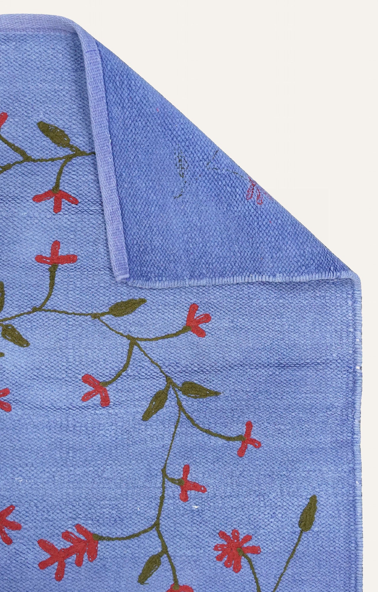 Handwoven Cotton Rug with Floral Embroidery