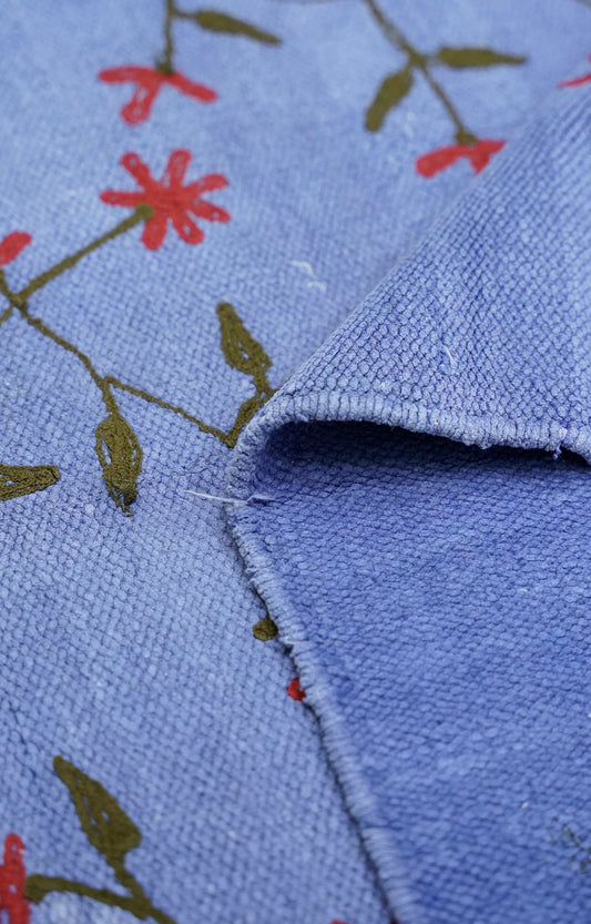 Handwoven Cotton Rug with Floral Embroidery