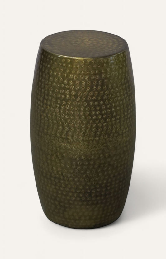 Beaten metal oval table