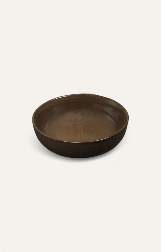 Brown glazed ceramic studio bowl with smooth finish