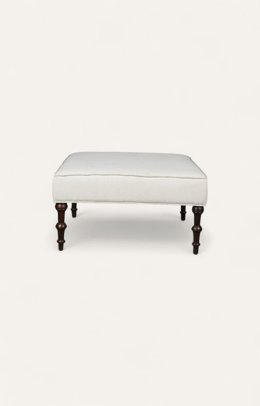 Traditional Ottoman with Cream Upholstery and Dark Turned Legs