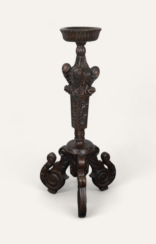 Large ornate wooden candle holder with tripod scroll base in dark finish