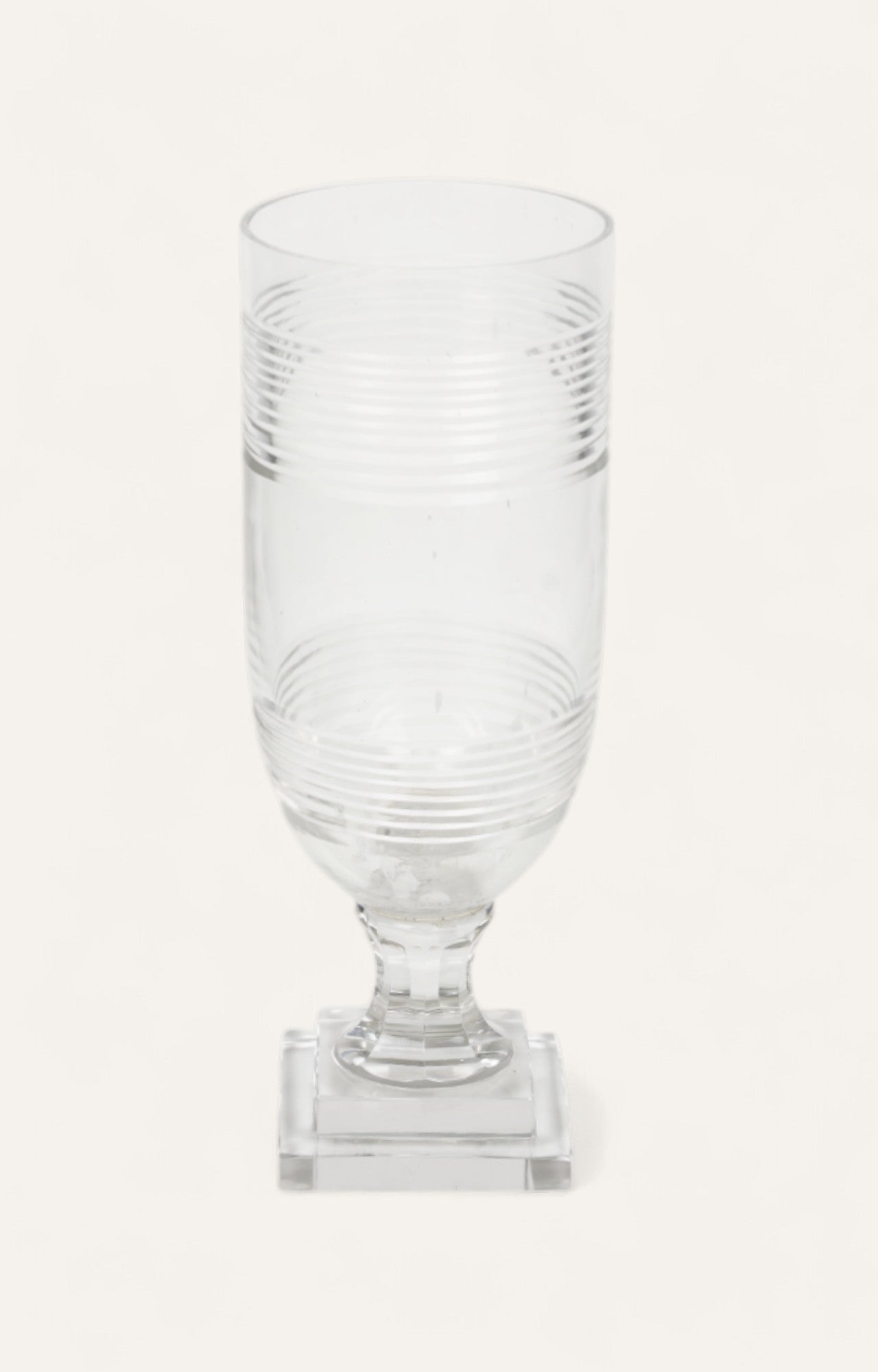 Clear striped glass hurricane candle holder with square base
