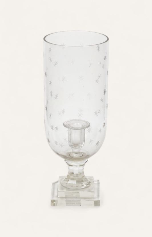 Star-patterned clear glass hurricane candle holder on square base