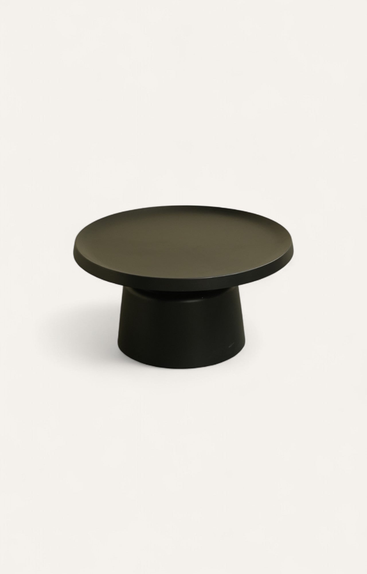 Set of two round nesting tables made of iron with black enameled coating.