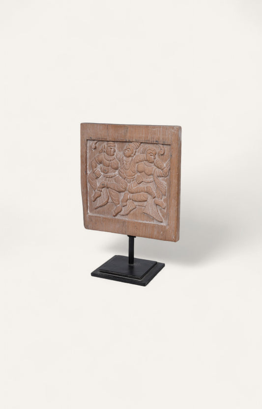 Vintage Indian wooden panel with carved dancers on an iron base