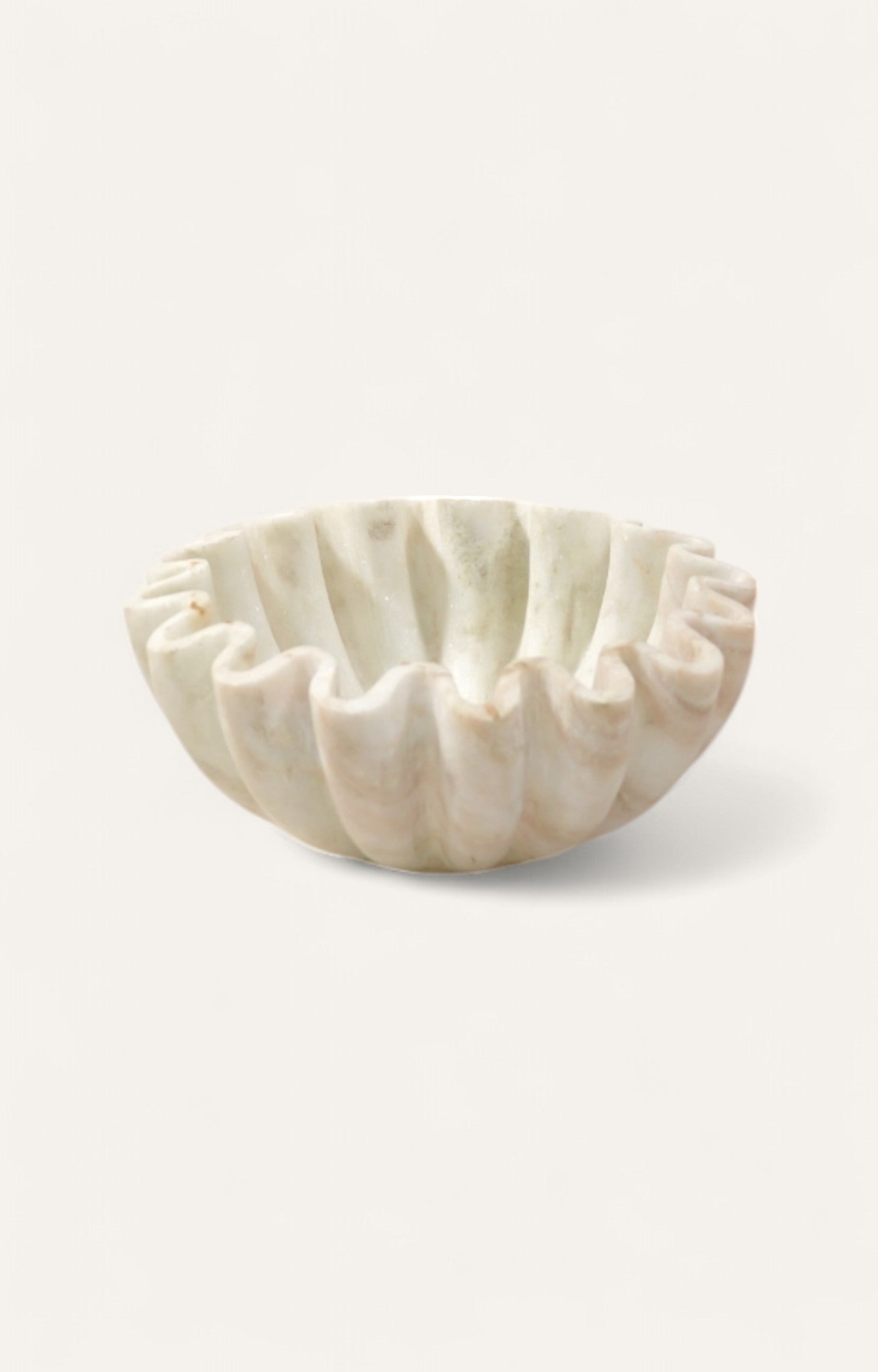 Frilled-edge white marble bowl with wavy carved detailing