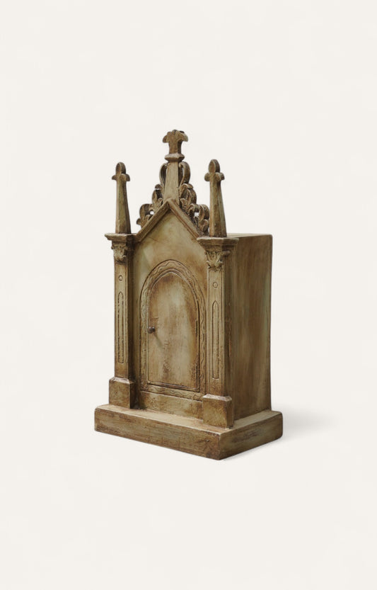 Distressed wooden shrine cabinet with Gothic detailing