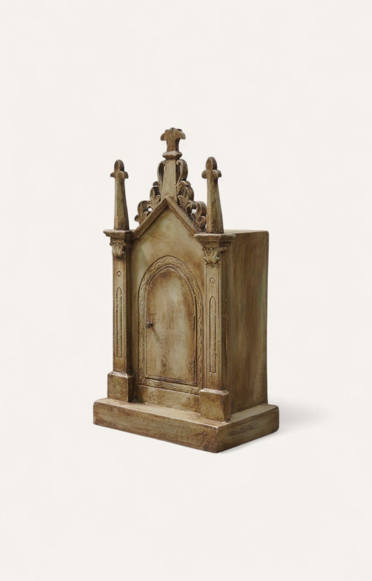 Distressed wooden shrine cabinet with Gothic detailing
