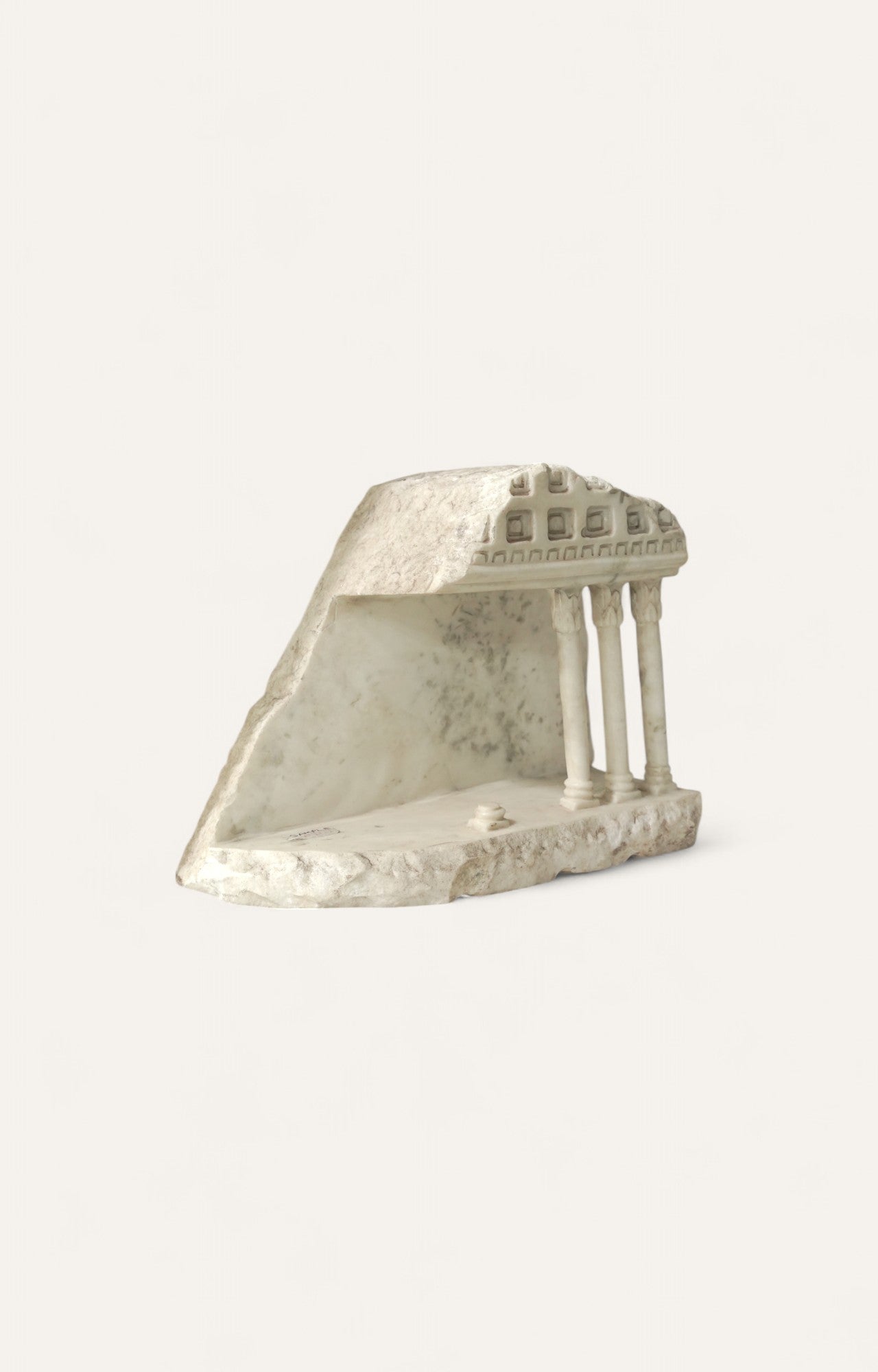 Marble relief sculpture of a portico ruin with column detailing 