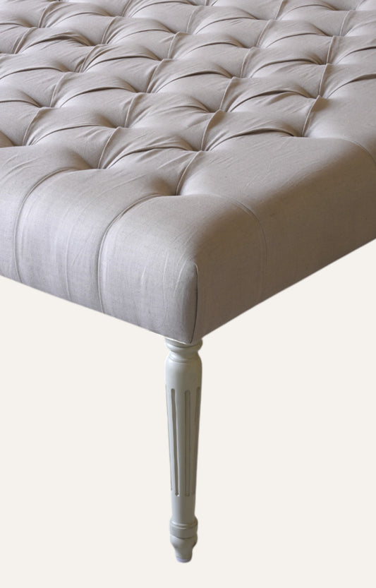 Classic Tufted Ottoman with Turned Wooden Legs