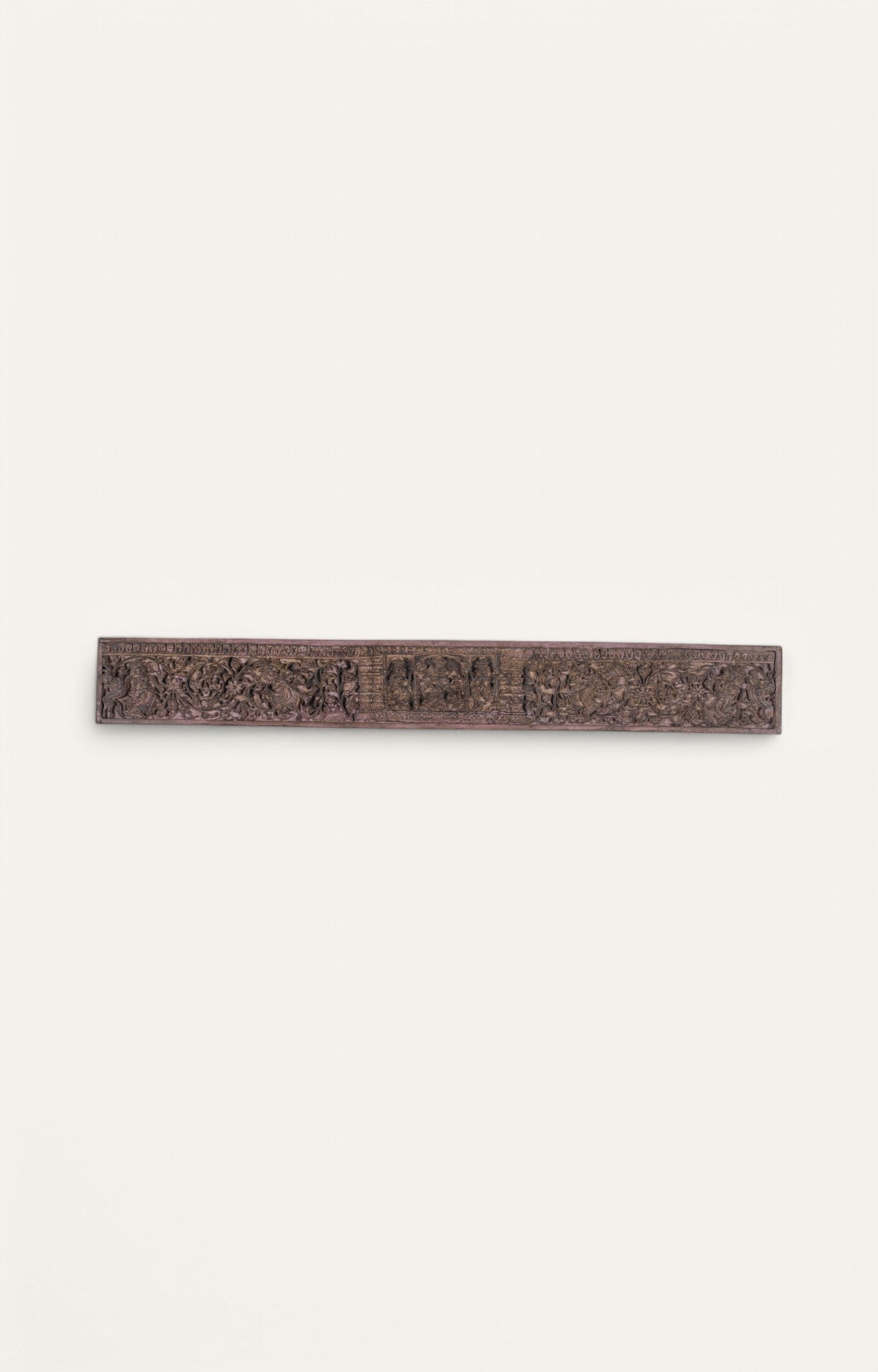  Vintage rose-toned carved wooden panel with deity and floral motifs