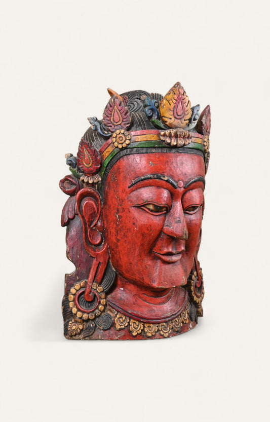 Hand-carved vintage red Himalayan wall mask in teak wood with patina